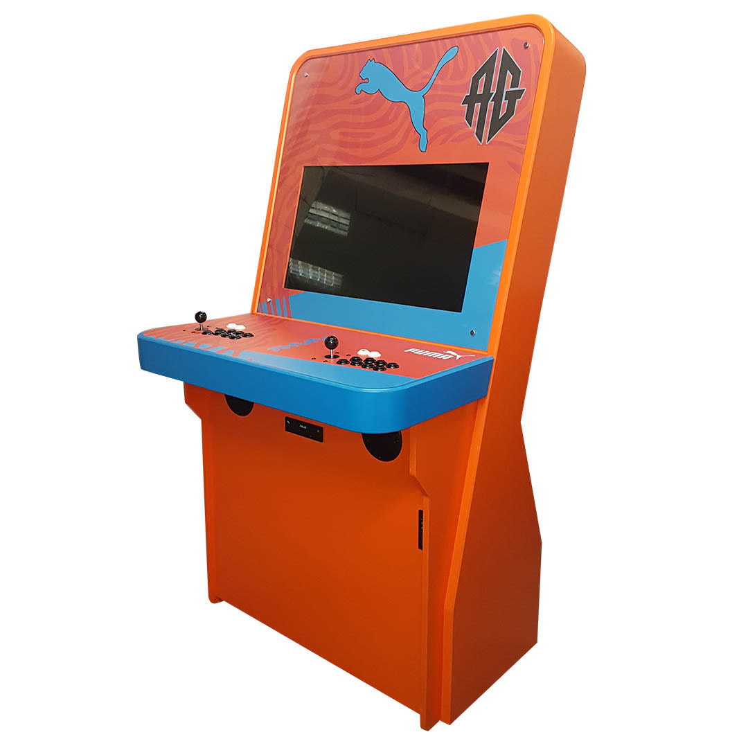 Nu-Gen Stand-up Elite arcade machine in orange with Puma decals front right profile