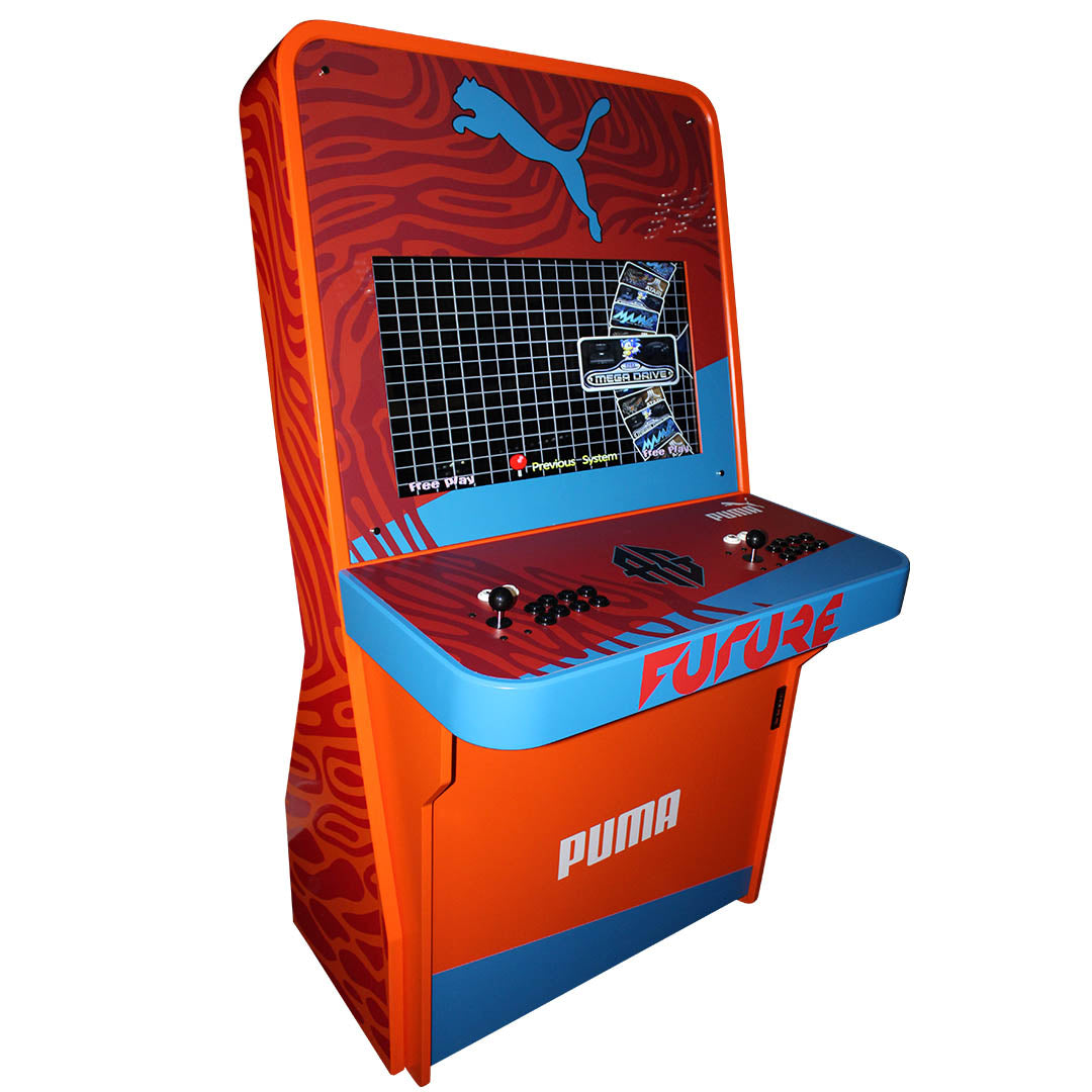 Nu-Gen Stand-up Media arcade machine in orange with Puma decals front left profile